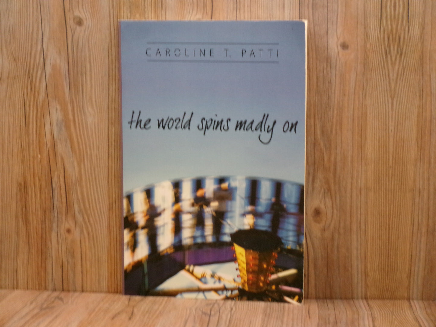 The World Spins Madly On by Caroline T. Patti