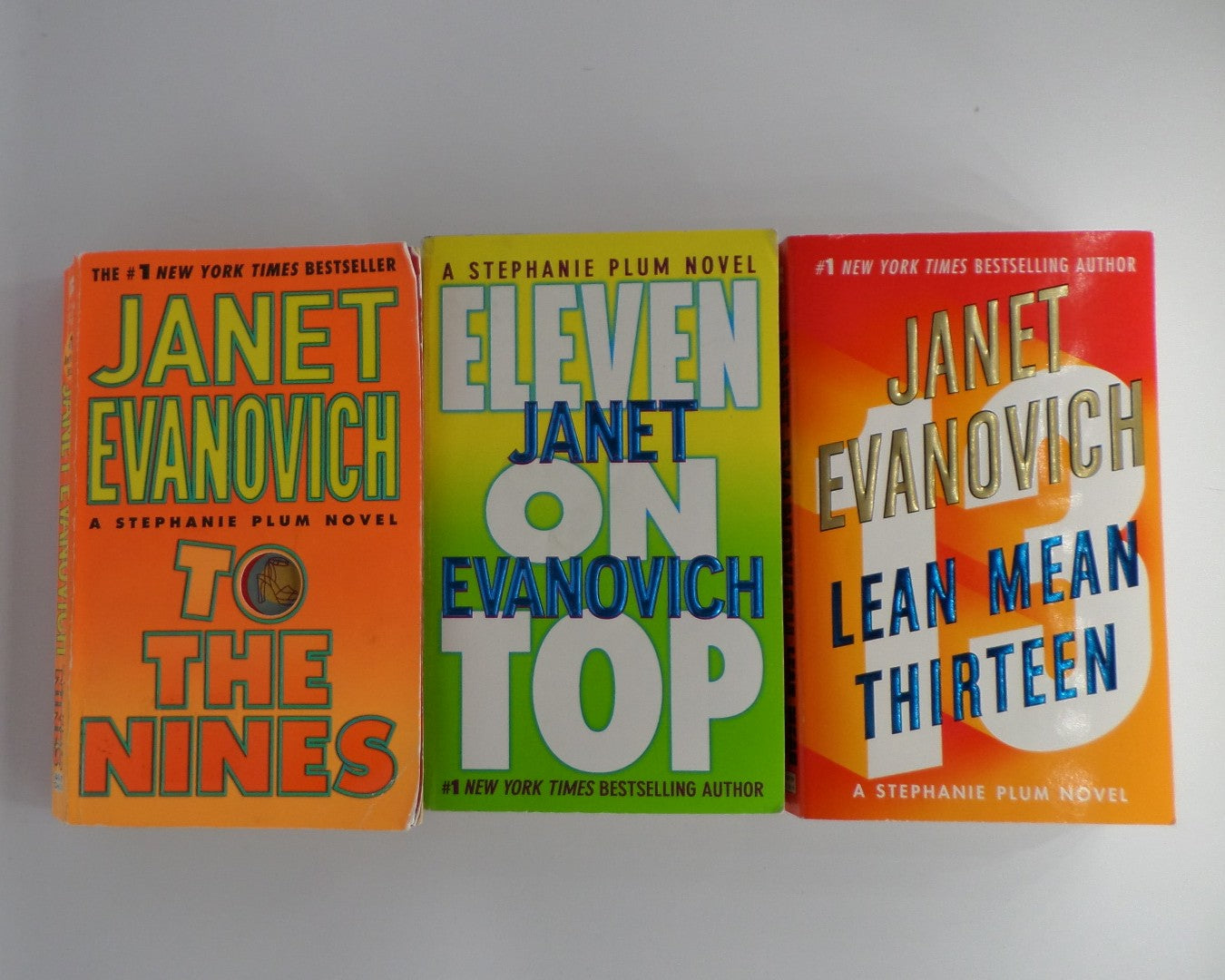 Bundle: Janet Evanovich Novels: Eleven On Top, To The Nines, and Lean Mean Thirteen