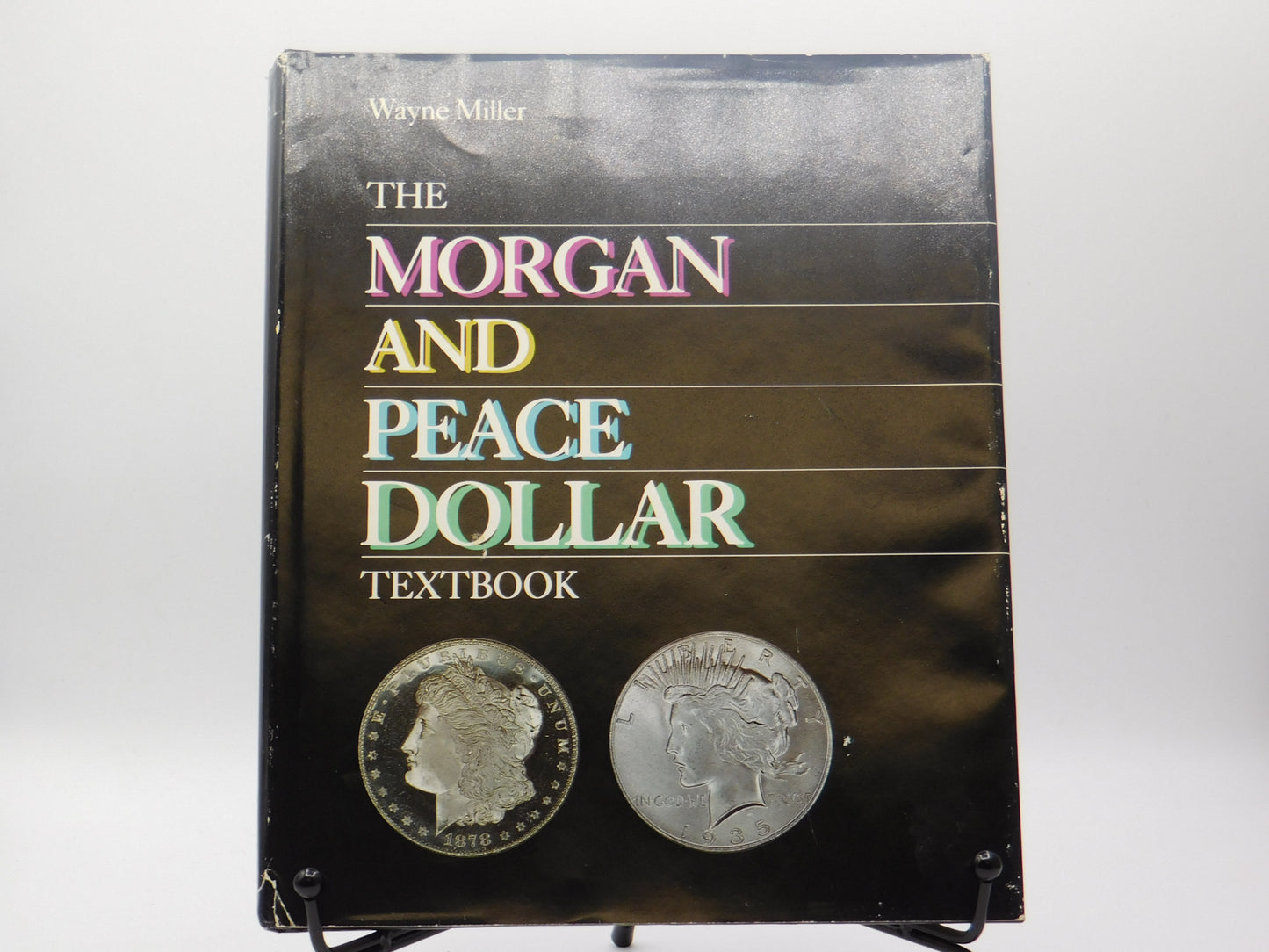 The Morgan and Peace Dollar Textbook by Wayne Miller